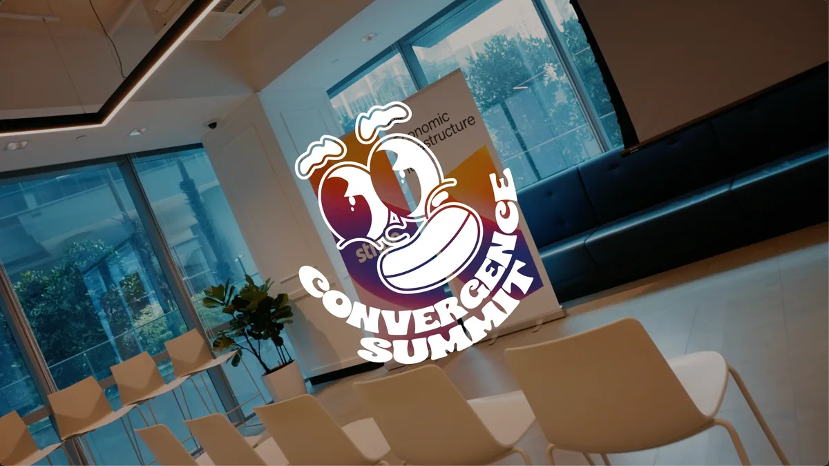 Convergence Summit venue photo with event branding