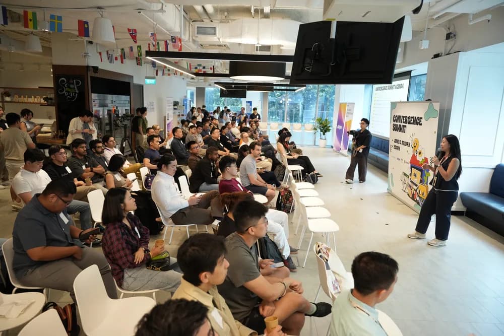 Audience seated during a Convergence Summit session