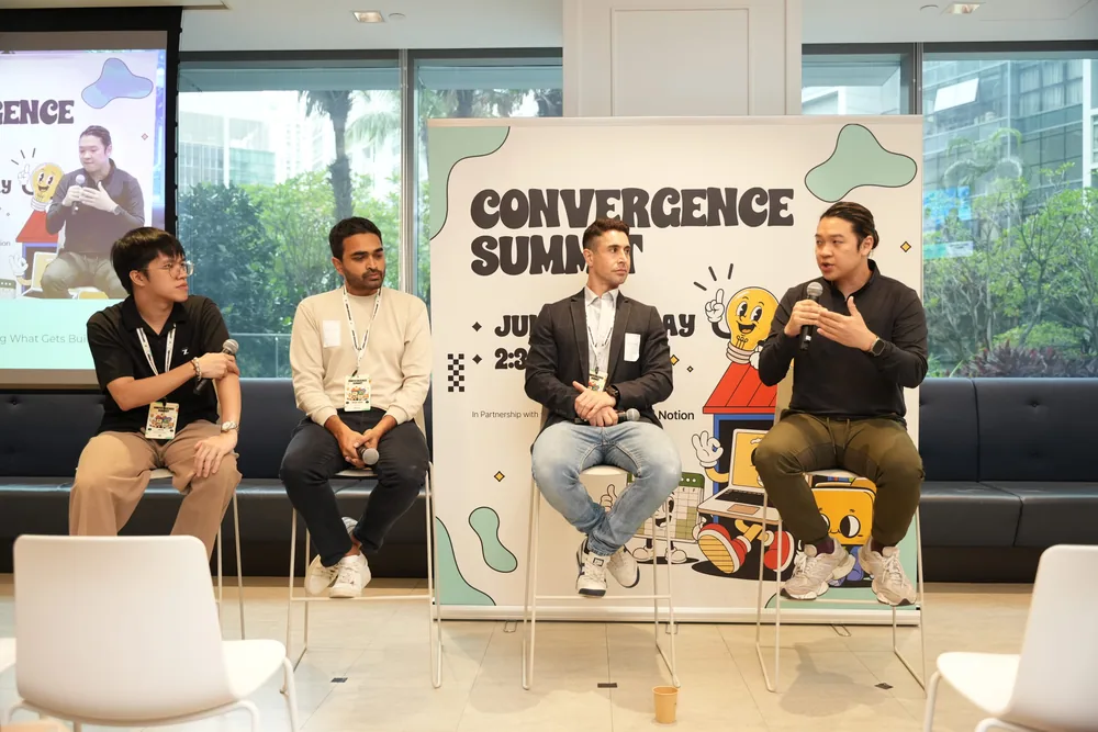 Panelists speaking at Convergence Summit