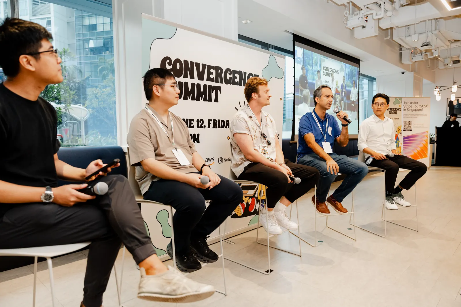 Convergence Summit panelists on stage in front of the audience in Singapore