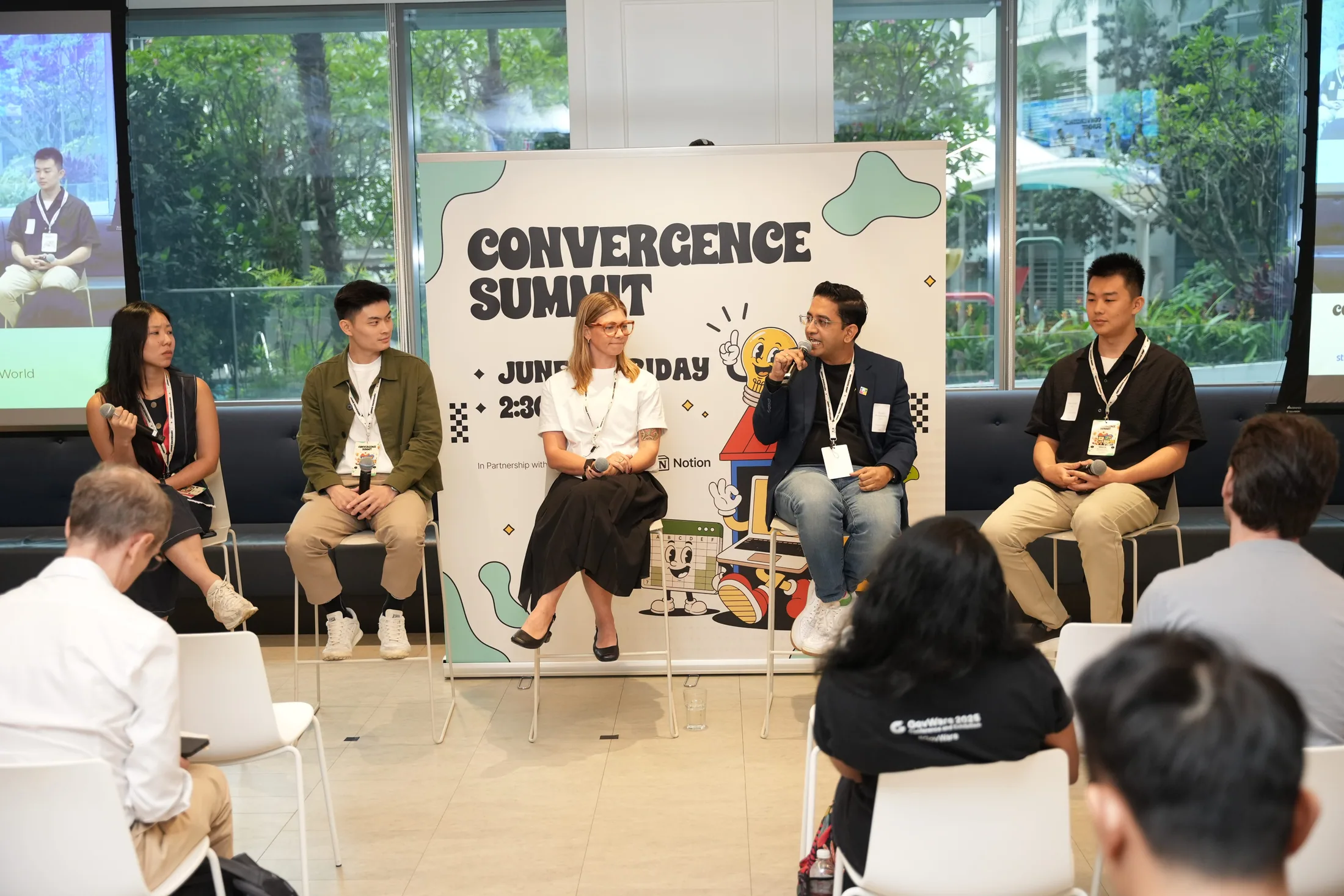 Convergence Summit panelists on stage in Singapore